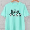 Kaos Snoopy The Beagles Band – Parodi The Beatles Lucu & Nostalgia | Kaos Musik Pop Culture | T-shirt Distro Unisex Pria Wanita Baju Lengan Pendek Bahan Katun - DJAVASTREET - Gambar 12